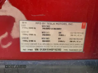 2016 Tesla Model S 90D with VIN 5YJSA1E44GF162393, listed as a Copart auction lot 51708825 with 173,880 mi miles and Salvage title. Bid and sale history available at DreamBid. Image 13.
