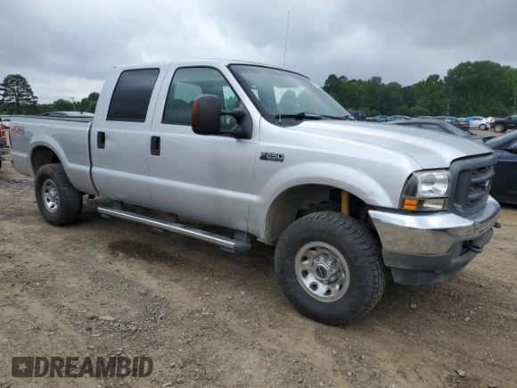 2004 Ford F-250 XL with VIN 1FTNW21L94EE03900, listed as a Copart auction lot 57838765 with 185,837 mi miles and Salvage title. Bid and sale history available at DreamBid. Image 4.