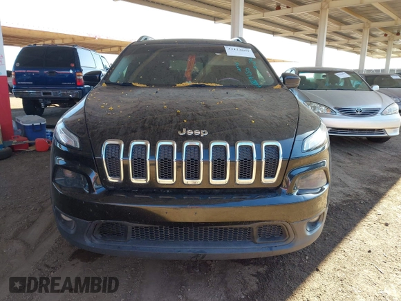 2015 Jeep Cherokee Latitude with VIN 1C4PJLCB8FW669150, listed as a IAAI auction lot 42122669 with 194,525 mi miles and . Bid and sale history available at DreamBid. Image 12.