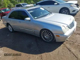 2001 Mercedes-Benz E-Class with VIN WDBJF65J61B373135, listed as a IAAI auction lot 42149598 with 123,314 mi miles. Bid and sale history available at carsss.com. Image 1.