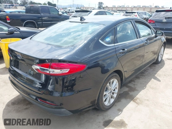 2020 Ford Fusion SE z VIN 3FA6P0LU7LR170922, wystawiony jako IAAI lot #42121025 z przebiegiem 115 799 mil mil oraz . Historia ofert i sprzedaży dostępna na DreamBid. Obrazek 4.