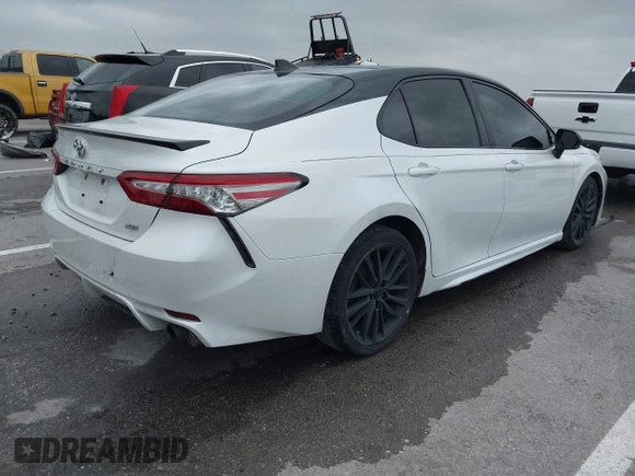 2019 Toyota Camry XSE with VIN 4T1BZ1HK3KU024875, listed as a IAAI auction lot 40952896 with 151,535 mi miles and . Bid and sale history available at DreamBid. Image 4.