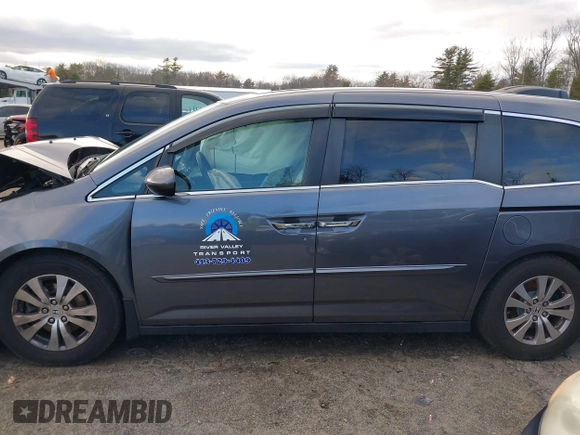 2014 Honda Odyssey EX-L with VIN 5FNRL5H67EB073640, listed as a IAAI auction lot 41115124 with 99,841 mi miles and . Bid and sale history available at carsss.com. Image 14.