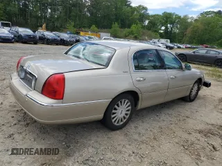 2005 Lincoln Town Car Signature z VIN 1LNHM81W35Y626266, wystawiony jako Copart lot #57461675 z przebiegiem 315 827 mil mil oraz Czysty tytuł • Clean title. Historia ofert i sprzedaży dostępna na DreamBid. Obrazek 3.