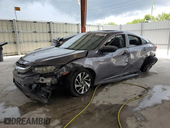 2017 Honda Civic LX with VIN 19XFC2F56HE206118, listed as a Copart auction lot 58777885 with 59,710 mi miles and Salvage title. Bid and sale history available at DreamBid. Image 1.