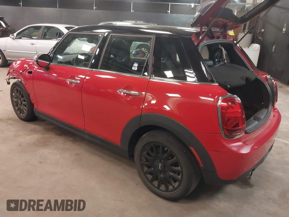 2019 MINI Hardtop 4 Door Cooper with VIN WMWXU1C57K2J02108, listed as a IAAI auction lot 42285864 with 19,383 mi miles and . Bid and sale history available at DreamBid. Image 3.