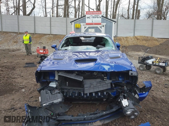 2021 Dodge Challenger R/T Scat Pack Widebody z VIN 2C3CDZFJXMH615361, wystawiony jako IAAI lot #41911374 z przebiegiem 27 159 mil mil oraz . Historia ofert i sprzedaży dostępna na DreamBid. Obrazek 13.