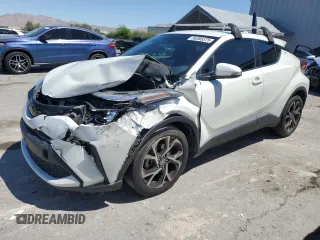 2020 Toyota C-HR LE z VIN JTNKHMBX6L1067070, wystawiony jako Copart lot #56385375 z przebiegiem 79 901 mil mil oraz Szkoda całkowita • Salvage title. Historia ofert i sprzedaży dostępna na DreamBid. Obrazek 1.