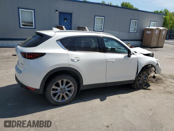 2020 Mazda CX-5 Grand Touring with VIN JM3KFBDM7L1851699, listed as a Copart auction lot 56475715 with Not Provided miles and Salvage Title. Bid and sale history available at DreamBid. Image 3.