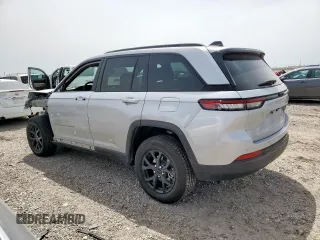 2024 Jeep Grand Cherokee Laredo X with VIN 1C4RJGAG2RC243586, listed as a Copart auction lot 56725245 with 10,735 mi miles and Salvage title. Bid and sale history available at DreamBid. Image 2.
