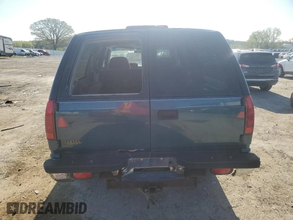 1994 GMC Suburban z VIN 1GKFK16K4RJ754534, wystawiony jako Copart lot #56044145 z przebiegiem 224 747 mil mil oraz Nie do naprawy • Non repairable. Historia ofert i sprzedaży dostępna na DreamBid. Obrazek 6.