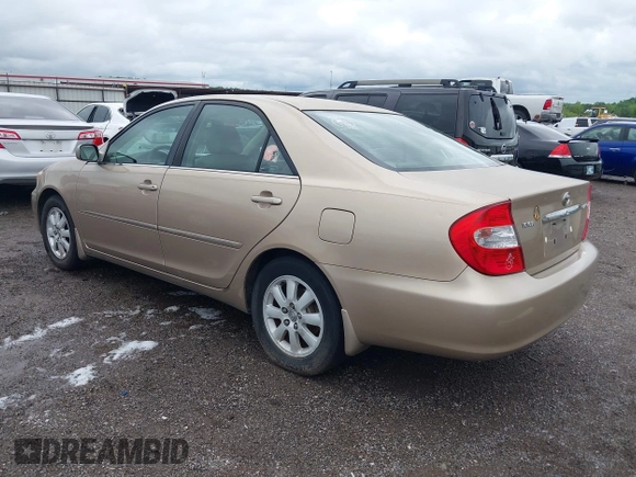 2002 Toyota Camry LE z VIN 4T1BE32K52U086150, wystawiony jako IAAI lot #42126685 z przebiegiem 175 212 mil mil oraz . Historia ofert i sprzedaży dostępna na DreamBid. Obrazek 3.
