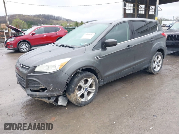 2015 Ford Escape SE with VIN 1FMCU9GX6FUC73272, listed as a IAAI auction lot 41966307 with 118,144 mi miles and . Bid and sale history available at DreamBid. Image 2.