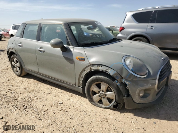 2019 MINI Hardtop 4 Door Cooper with VIN WMWXU1C57K2L09744, listed as a Copart auction lot 49324595 with 40,554 mi miles and Salvage Title. Bid and sale history available at carsss.com. Image 4.
