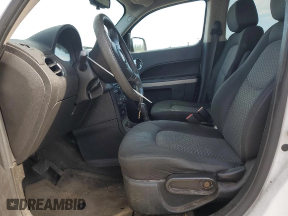 2010 Chevrolet HHR LS with VIN 3GNBAADB5AS651620, listed as a Copart auction lot 62774555 with 123,474 mi miles and Clean title. Bid and sale history available at DreamBid. Image 7.