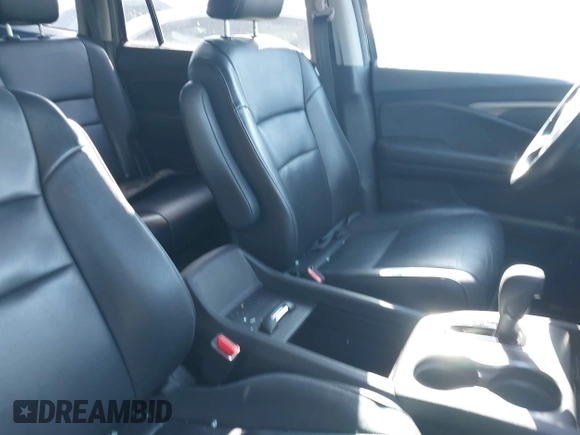 2016 Honda Pilot EX-L with VIN 5FNYF5H59GB005482, listed as a IAAI auction lot 41304248 with 127,092 mi miles and . Bid and sale history available at DreamBid. Image 5.