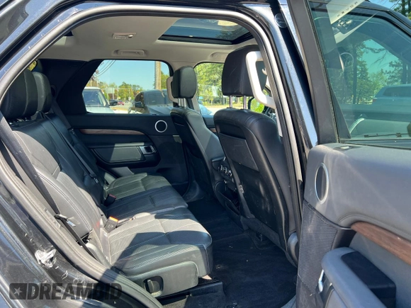 2017 Land Rover Discovery HSE with VIN SALRRBBV7HA045811, listed as a Copart auction lot 56986075 with 142,357 mi miles and Clean Title. Bid and sale history available at DreamBid. Image 6.