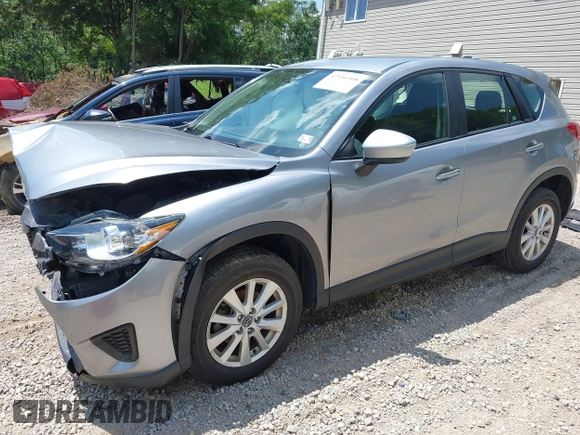 2014 Mazda CX-5 Sport with VIN JM3KE2BEXE0329303, listed as a IAAI auction lot 42556908 with 127,836 mi miles and . Bid and sale history available at DreamBid. Image 17.