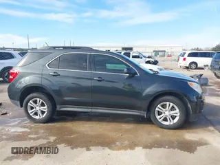 2014 Chevrolet Equinox LT z VIN 2GNFLFEK0E6106954, wystawiony jako IAAI lot #41358054 z przebiegiem 132 098 mil mil oraz . Historia ofert i sprzedaży dostępna na DreamBid. Obrazek 13.