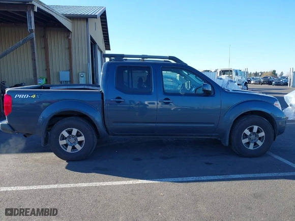 2013 Nissan Frontier SV with VIN 1N6AD0EV6DN731096, listed as a IAAI auction lot 41424331 with 121,534 mi miles. Bid and sale history available at carsss.com. Image 14.