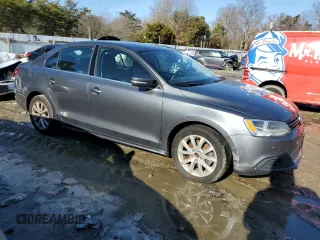 2014 Volkswagen Jetta Sedan SE with VIN 3VWD17AJ7EM256152, listed as a Copart auction lot 88283775 with 105,702 mi miles and Clean Title. Bid and sale history available at carsss.com. Image 4.
