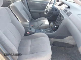 2000 Toyota Camry CE z VIN JT2BG22K6Y0433633, wystawiony jako IAAI lot #42409568 z przebiegiem 119 672 mil mil oraz . Historia ofert i sprzedaży dostępna na DreamBid. Obrazek 5.