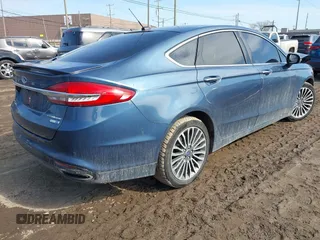 2018 Ford Fusion Titanium with VIN 3FA6P0D94JR187880, listed as a IAAI auction lot 41690869 with 120,214 mi miles and . Bid and sale history available at DreamBid. Image 4.