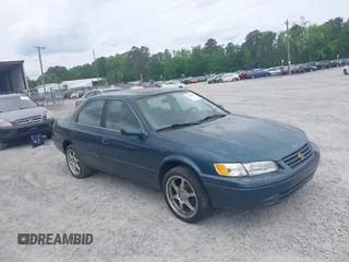 1997 Toyota Camry LE z VIN 4T1BG22K7VU005271, wystawiony jako IAAI lot #42098097 z przebiegiem Nie podano mil oraz . Historia ofert i sprzedaży dostępna na DreamBid. Obrazek 1.