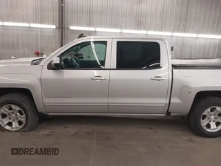 2017 Chevrolet Silverado 1500 LT with VIN 3GCUKREC5HG318772, listed as a IAAI auction lot 42056116 with 82,987 mi miles and . Bid and sale history available at DreamBid. Image 15.