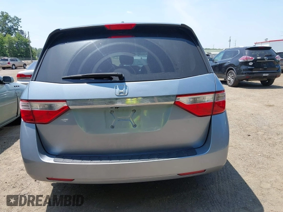 2011 Honda Odyssey EX-L with VIN 5FNRL5H60BB051135, listed as a IAAI auction lot 42588994 with 195,112 mi miles and . Bid and sale history available at DreamBid. Image 16.