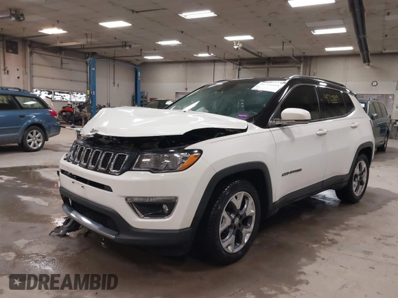 2021 Jeep Compass Limited with VIN 3C4NJCCB0MT576990, listed as a IAAI auction lot 41710809 with 77,903 mi miles. Bid and sale history available at carsss.com. Image 2.