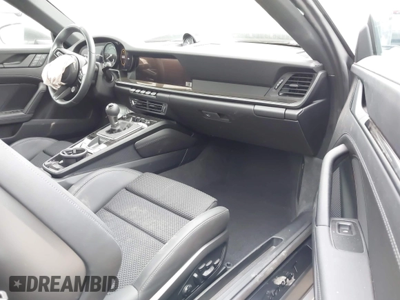 2023 Porsche 911 Carrera with VIN WP0AA2A93PS206048, listed as a IAAI auction lot 42022225 with 6,439 mi miles and . Bid and sale history available at DreamBid. Image 5.