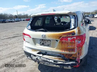 2019 Honda Pilot EX-L with VIN 5FNYF6H51KB052648, listed as a IAAI auction lot 41928269 with 67,878 mi miles and . Bid and sale history available at carsss.com. Image 6.
