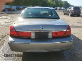 1999 Mercury Grand Marquis LS z VIN 2MEFM75W9XX687526, wystawiony jako Copart lot #51779995 z przebiegiem 196 466 mil mil oraz Szkoda całkowita • Salvage title. Historia ofert i sprzedaży dostępna na DreamBid. Obrazek 6.
