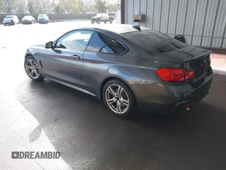 2015 BMW 4 Series 435i with VIN WBA3R1C59FK194649, listed as a IAAI auction lot 41565414 with 123,702 mi miles and . Bid and sale history available at DreamBid. Image 3.