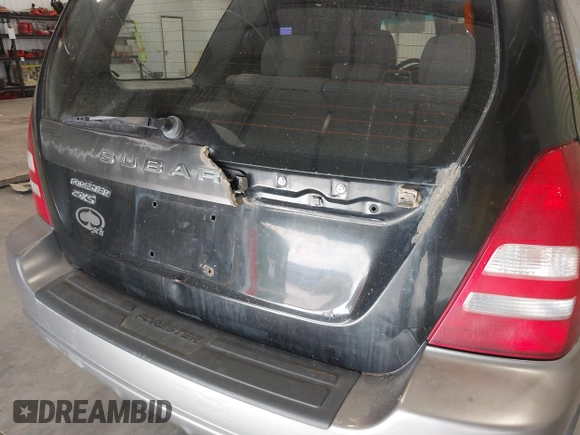 2003 Subaru Forester XS with VIN JF1SG65643H755247, listed as a IAAI auction lot 41836577 with 184,677 mi miles. Bid and sale history available at carsss.com. Image 13.