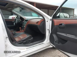 2009 Chevrolet Malibu LTZ with VIN 1G1ZK57719F109877, listed as a IAAI auction lot 41745297 with 151,862 mi miles and . Bid and sale history available at DreamBid. Image 5.
