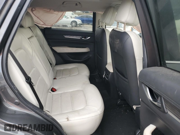 2021 Mazda CX-5 Grand Touring with VIN JM3KFBDM9M0452011, listed as a Copart auction lot 46230945 with 54,825 mi miles and Salvage Title. Bid and sale history available at carsss.com. Image 11.