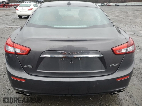 2017 Maserati Ghibli S Q4 z VIN ZAM57RTA4H1248389, wystawiony jako Copart lot #85218514 z przebiegiem 68 272 mil mil oraz Szkody całkowita. Historia ofert i sprzedaży dostępna na DreamBid. Obrazek 6.