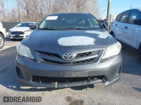 2011 Toyota Corolla L with VIN JTDBU4EE5B9140455, listed as a IAAI auction lot 41748242 with 319,346 mi miles. Bid and sale history available at carsss.com. Image 6.