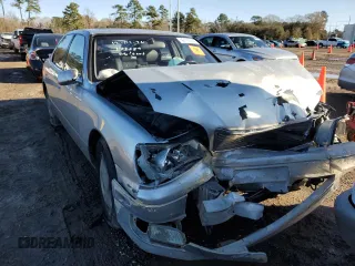 2000 Lexus LS 400 z VIN JT8BH28F6Y0173389, wystawiony jako Copart lot #42768585 z przebiegiem 143 535 mil mil oraz Szkoda całkowita • Salvage title. Historia ofert i sprzedaży dostępna na DreamBid. Obrazek 5.