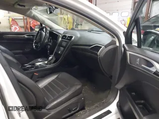 2013 Ford Fusion SE Hybrid with VIN 3FA6P0LU7DR254983, listed as a IAAI auction lot 41883531 with 188,585 mi miles and . Bid and sale history available at carsss.com. Image 5.