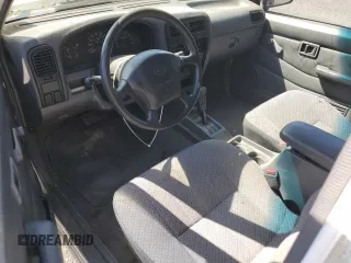 1996 Nissan Frontier XE с VIN 1N6SD16S8TC336698, выставлен на аукционе Copart как лот 59005305 с пробегом 286 264 миль миль и Чистый • Clean title. История ставок и продаж доступна на DreamBid. Изображение 8.