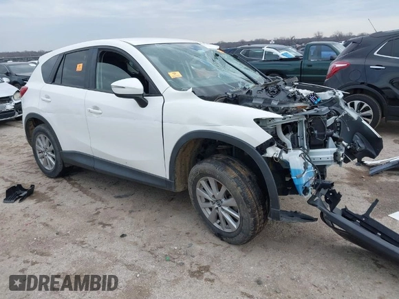 2016 Mazda CX-5 Touring with VIN JM3KE2CY1G0888850, listed as a IAAI auction lot 41562701 with 1 mi miles. Bid and sale history available at carsss.com. Image 1.
