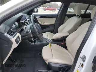 2023 BMW X2 sDrive28i with VIN WBXYH9C07P5V63719, listed as a Copart auction lot 87309194 with 43,124 mi miles and Salvage Title. Bid and sale history available at carsss.com. Image 7.