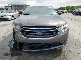 2014 Ford Taurus SEL z VIN 1FAHP2E80EG174910, wystawiony jako Copart lot #56070945 z przebiegiem 147 201 mil mil oraz Szkody całkowita. Historia ofert i sprzedaży dostępna na DreamBid. Obrazek 5.
