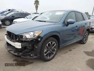 2016 Mazda CX-5 Grand Touring with VIN JM3KE2DY7G0875678, listed as a IAAI auction lot 42104888 with 30,566 mi miles. Bid and sale history available at carsss.com. Image 20.