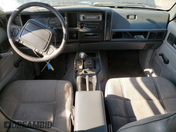 1995 Jeep Cherokee Sport with VIN 1J4FJ67S4SL519629, listed as a Copart auction lot 76107844 with 312,532 mi miles and Salvage Title. Bid and sale history available at carsss.com. Image 8.