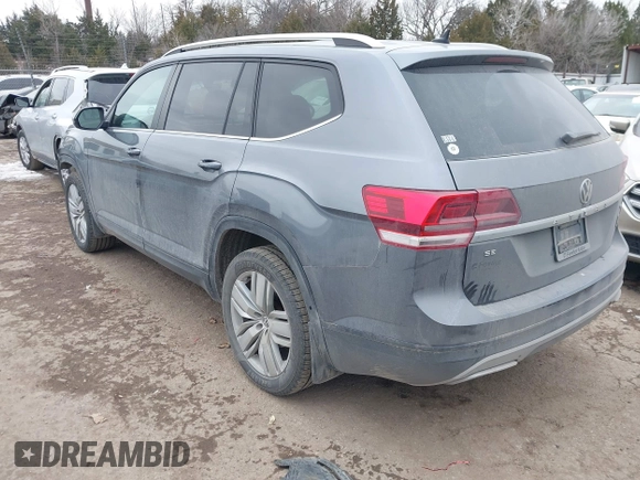 2019 Volkswagen Atlas SE with VIN 1V2WR2CA2KC581212, listed as a IAAI auction lot 41631619 with 122,160 mi miles and . Bid and sale history available at DreamBid. Image 3.