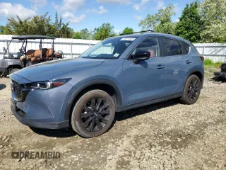 2023 Mazda CX-5 S Carbon Edition z VIN JM3KFBCM9P0110080, wystawiony jako Copart lot #55911635 z przebiegiem 20 835 mil mil oraz Szkody całkowita. Historia ofert i sprzedaży dostępna na DreamBid. Obrazek 1.